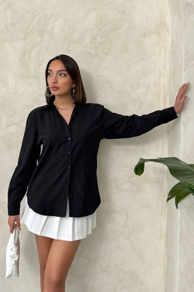 Zwarte blouse met kanten rug zwarte blouse